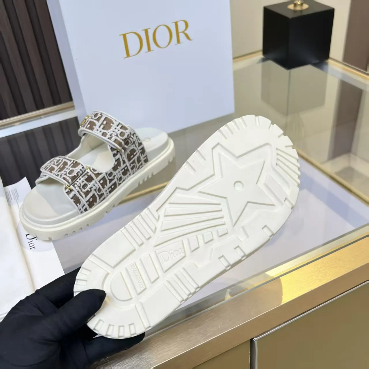 👟👟Ex-factory price 480👟👟 Dior classic popular sandals Step into the fashion territory of Dior slippers and encounter the ultimate fusion of elegance and comfort. The upper is engraved with the Christian Dior Paris logo using exquisite embroidery technology. The delicate stitching tells the brand's profound heritage and is fully recognizable.   Made of high-quality materials, it feels soft and fits your feet, as if it is a gentle care tailor-made for your feet. The sole is carefully designed and engraved with Christian Dior's lucky star symbol. It is not only a beautiful embellishment, but also provides reliable grip, making every step steady and secure.   It has a simple design and is easy to put on and take off. Whether it is a lazy weekend or a pleasant vacation, it can be easily adapted. Whether paired with casual shorts, casual jeans, or an elegant dress, Dior slippers can instantly enhance the overall style and show a casual fashion attitude.   Dior slippers, in the name of fashion, inject luxurious charm into your life and accompany you with every step you take with confidence and elegance. Material: Fine genuine cowhide upper, outsole, TPR, non-slip and wear-resistant, code number: 35-41 (42 customized)